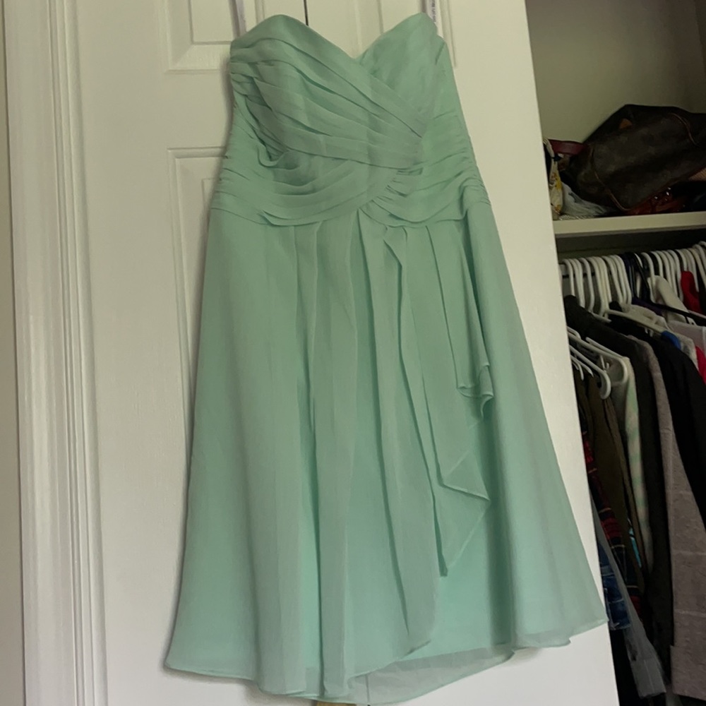 Brand new with tags. Mint size 8 David’s Bridal